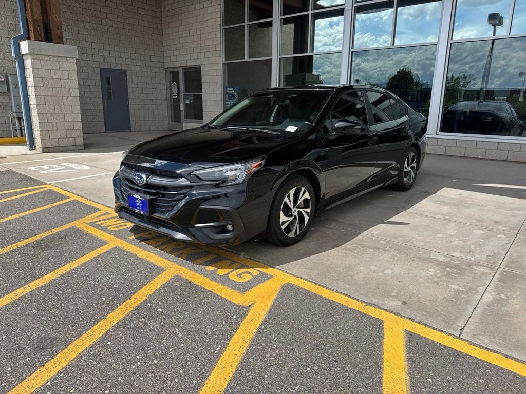 2024 Subaru Legacy Premium in Crystal Black Silica — front three-quarter view