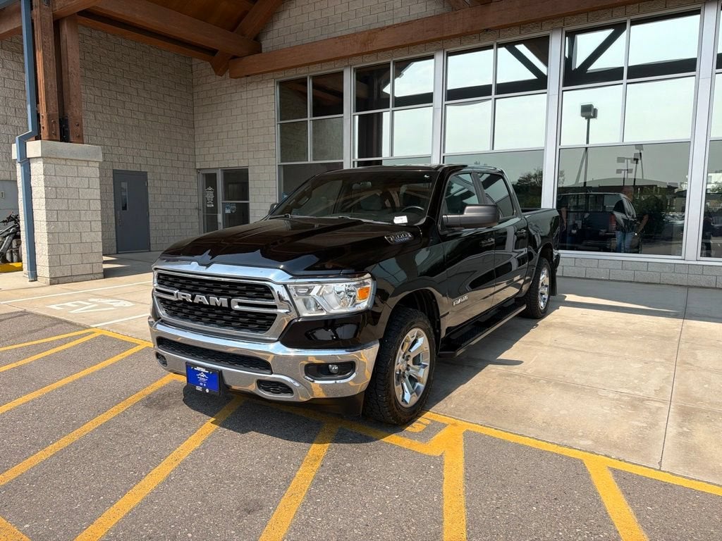 2022 RAM 1500 Big Horn Crew Cab 4x4 5'7" Box in Black — front three-quarter view