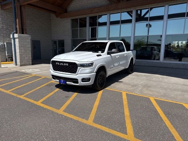 2025 RAM 1500 Big Horn Crew Cab 4x4 5'7" Box in White — front three-quarter view