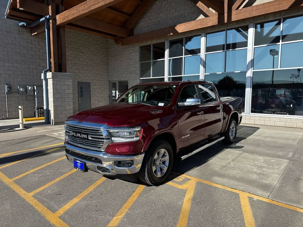 2020 RAM 1500 Laramie Crew Cab 4x4 5'7" Box in Red — front three-quarter view