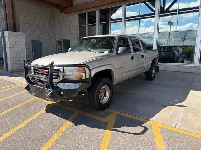 2006 GMC Sierra 2500 HD Work Truck in Gold — front three-quarter view