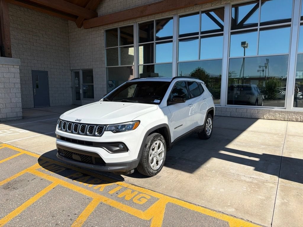 2024 Jeep Compass Latitude in White — front three-quarter view
