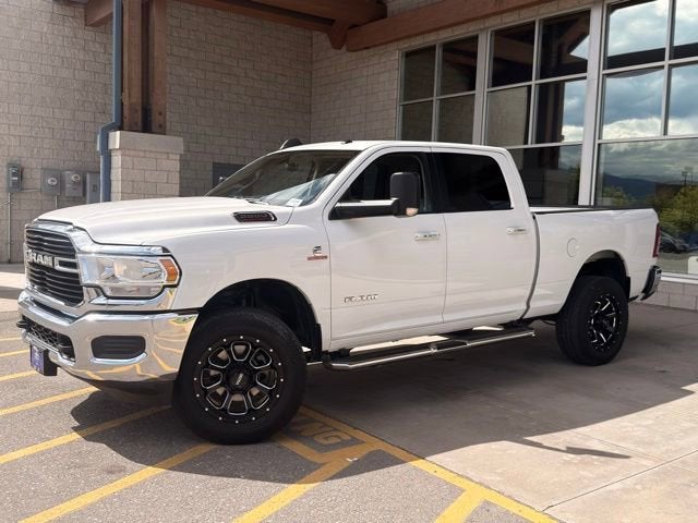 2019 RAM 2500 Big Horn Crew Cab 4x4 6'4" Box in White — front three-quarter view