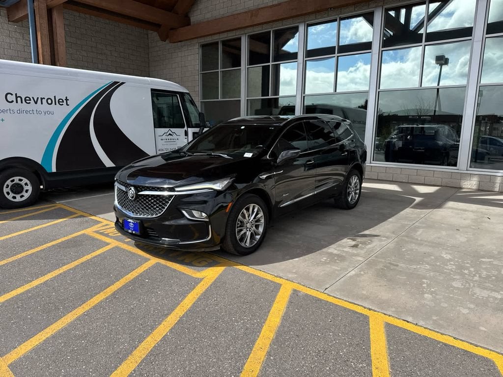 2023 Buick Enclave Avenir in Ebony Twilight Metallic — front three-quarter view